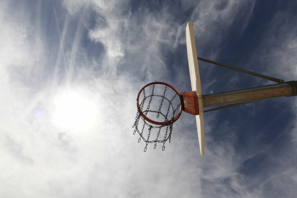 Dunking Dreams: A Captivating 5K Wallpaper Photo of a Basketball Basket