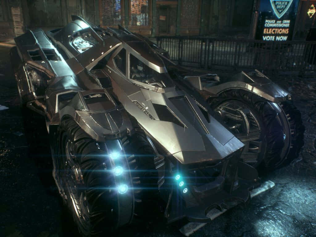 The Batmobile: Glistening Metal Marvel Parked in Urban Landscape Wallpaper
