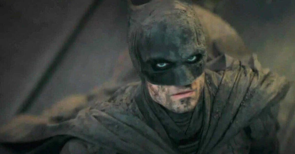 Batman Wallpaper: Gritty Movie Scene with Iconic Suit & Intense Gaze