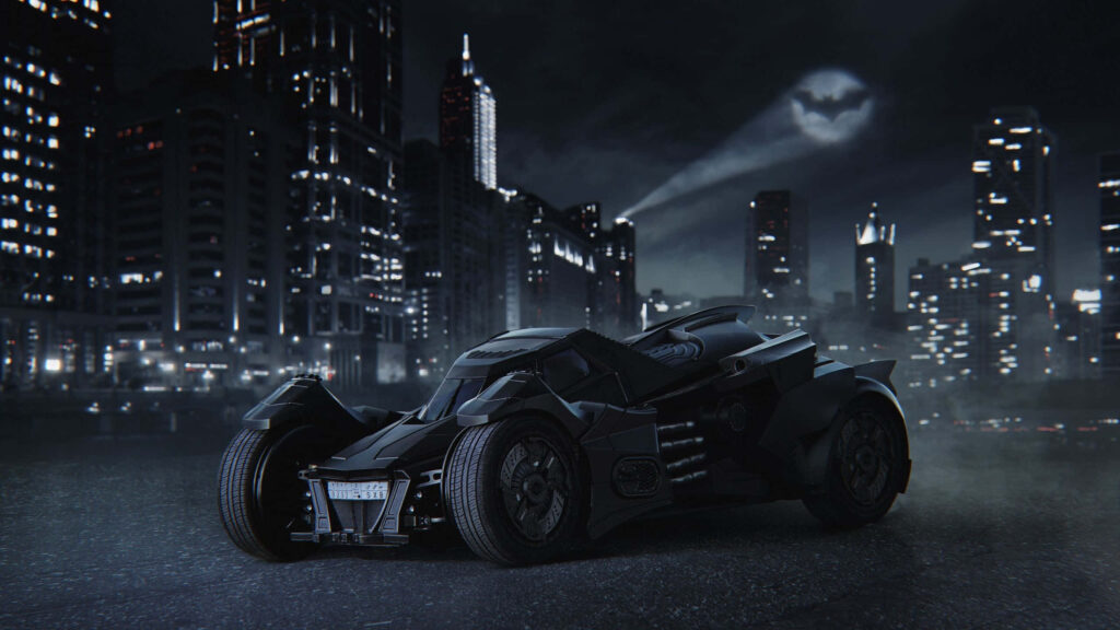 Batmobile parked in misty city at night with Bat-Signal glowing above Gotham skyline wallpaper