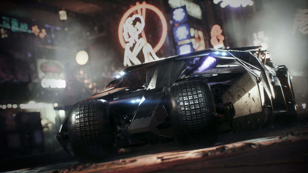 The Batmobile: Iconic Reflections Amidst a Stunning Gray Backdrop Wallpaper