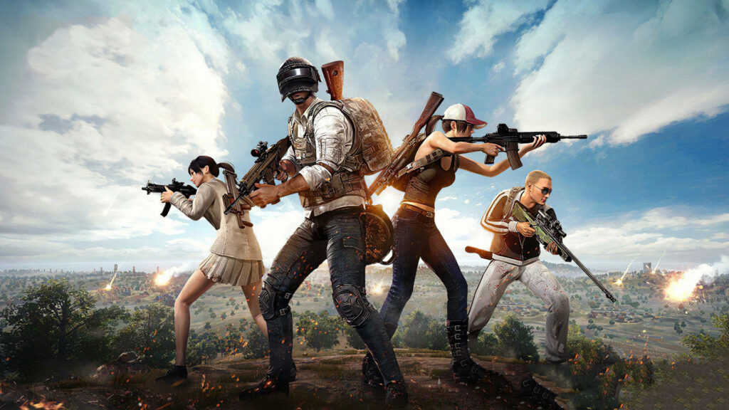 Tactical PUBG squad of four armed survivors in explosive battlefield under bright sky wallpaper