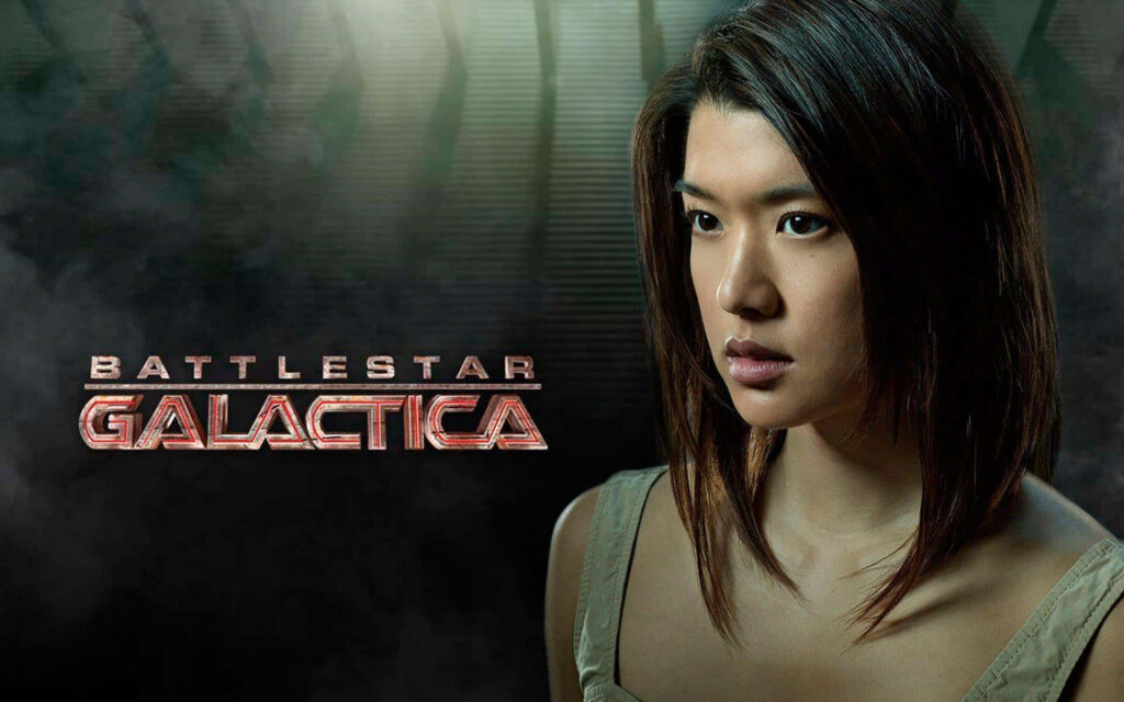 Battlestar Galactica wallpaper featuring Sharon Valerii with dramatic background and show logo