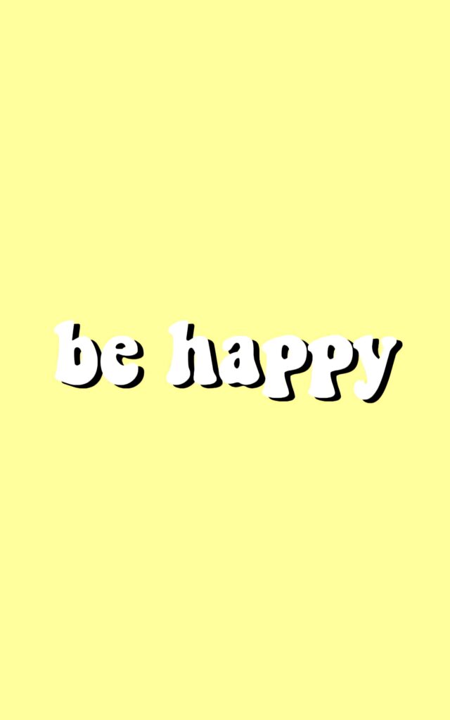 Bright yellow wallpaper with bold playful text be happy creating positive vibes