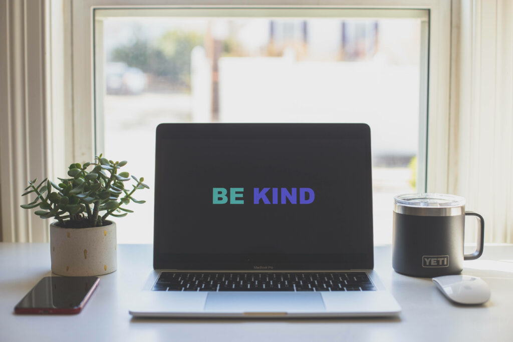 Productivity Sanctuary: Embracing Nature and Kindness in Your Workspace Wallpaper