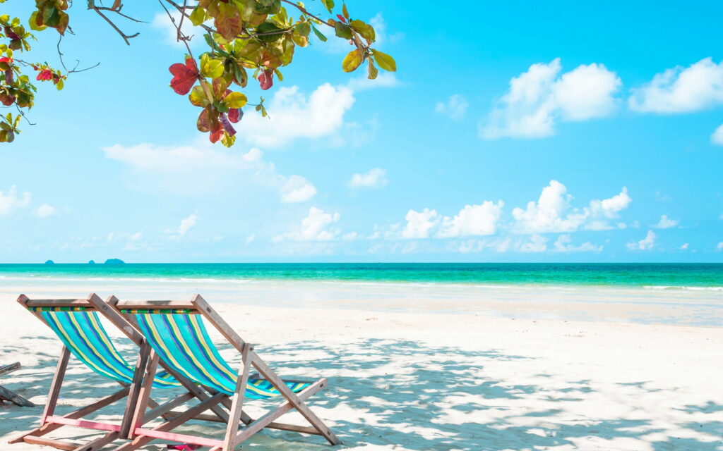 Paradise Found: A Serene Escape at the Tropical Beach Wallpaper