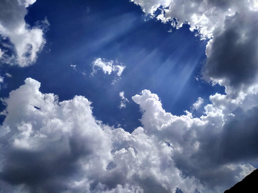 Serene Blue Sky with Sun Rays - Stunning Nature HD Wallpaper