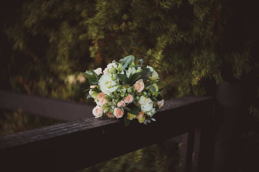 Elegant Bouquet of Roses Against Softly Blurred Greenery Background Wallpaper