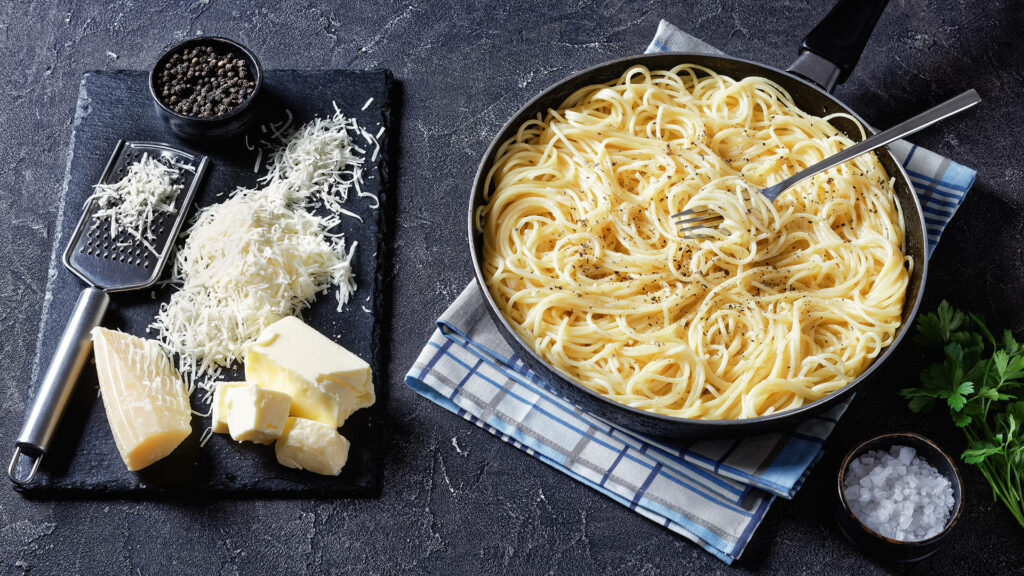 Stylish Cacio e Pepe Wallpaper: Rustic Pasta Plate with Parmesan