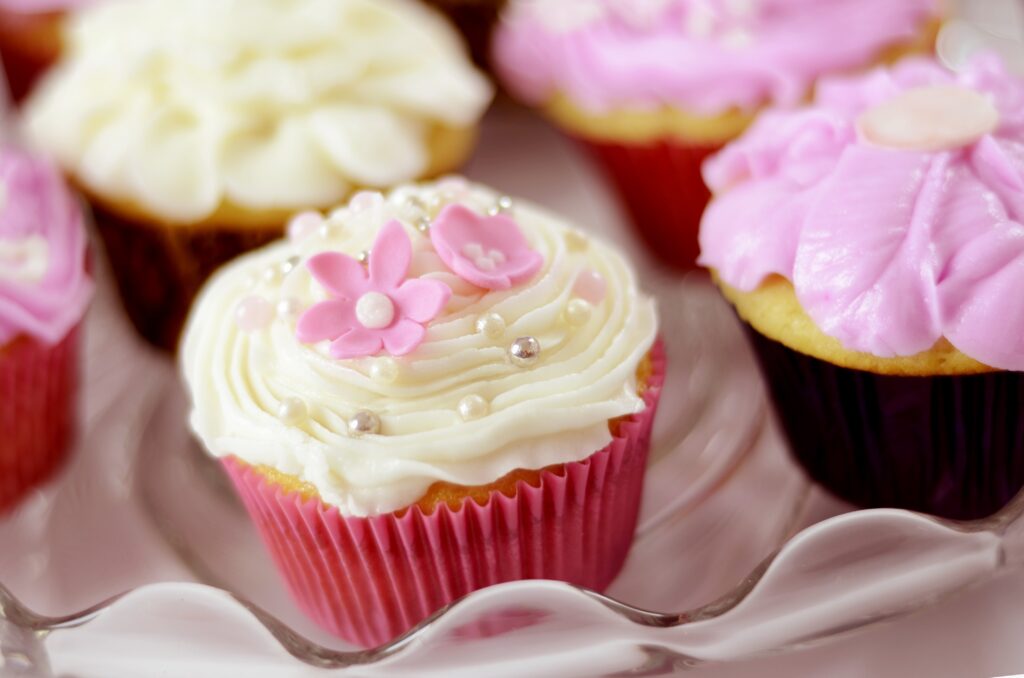 Delightful Cupcake Wallpaper: Intricate Frosting & Pastel Designs