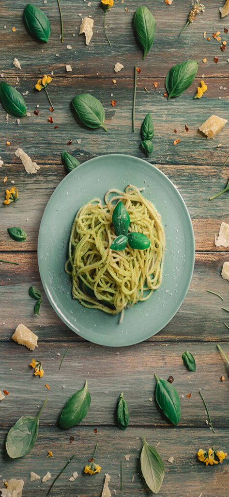 Charming Creamy Pesto Pasta Flat Lay: Rustic Wallpaper Background