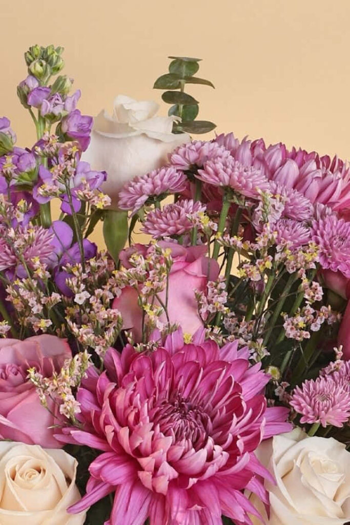 Elegant Pink and White Flower Bouquet on Warm Background Wallpaper