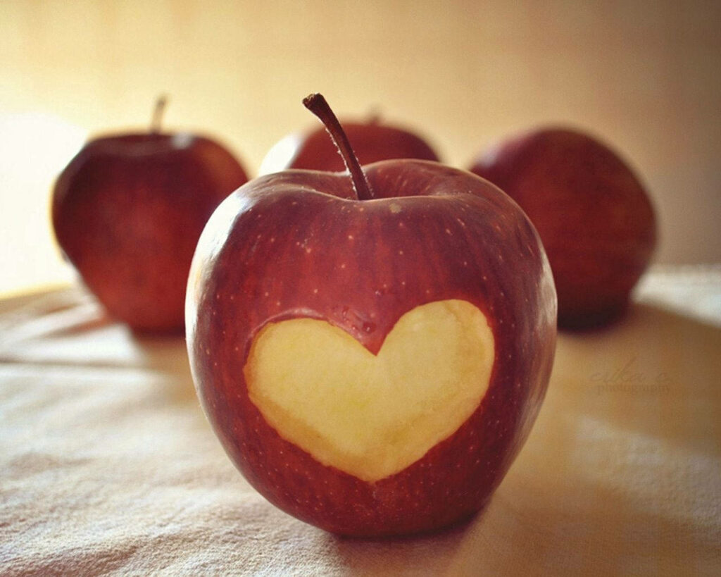 Artistic Red Apple Wallpaper: Love for Nutritious Food Background