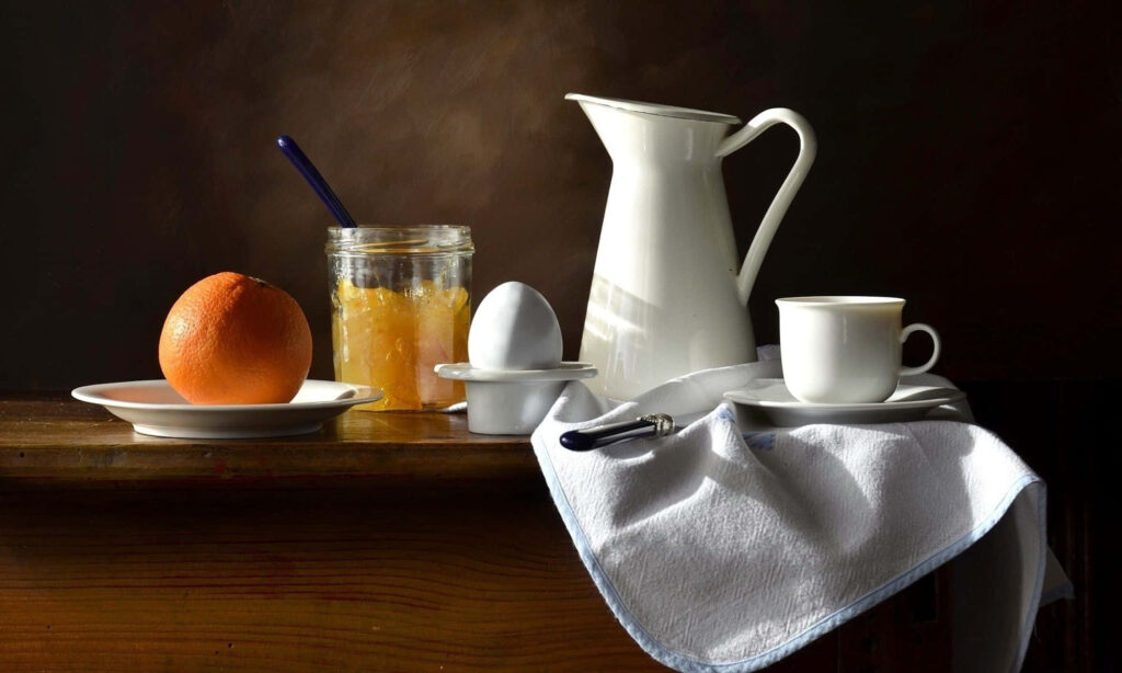 Classic Still Life: Orange, Marmalade & Egg on Wooden Table Wallpaper