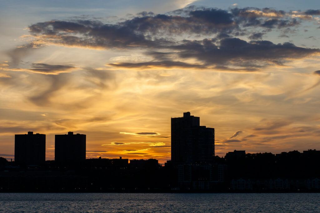 Stunning Sunset Wallpaper: Vibrant Clouds & Building Silhouettes