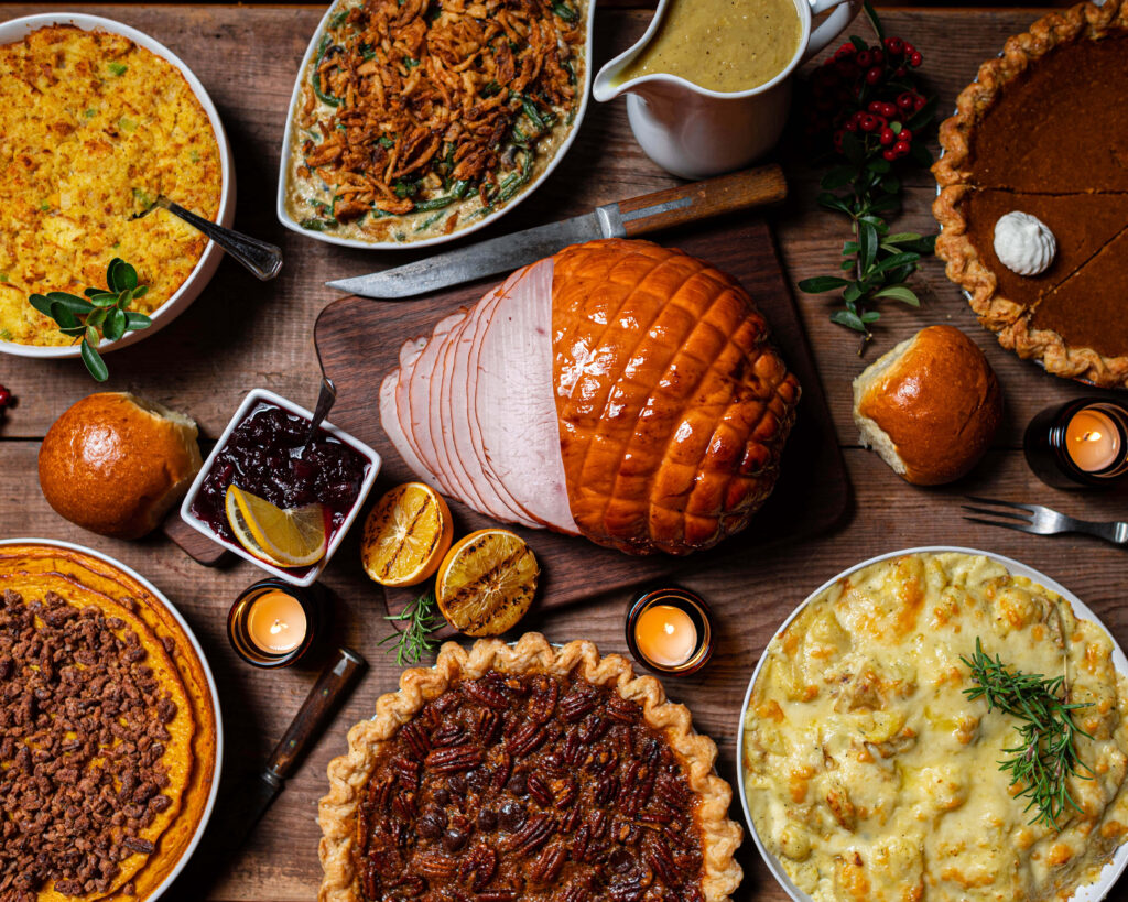 Thanksgiving Feast Wallpaper: Roasted Ham, Pies & Festive Sides