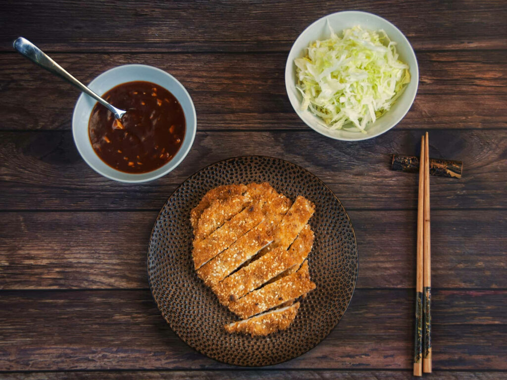Beautifully Plated Tonkatsu with Cabbage & Dipping Sauce Wallpaper