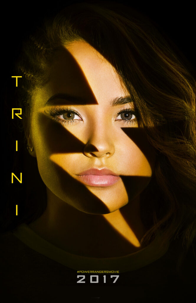 Becky G as Yellow Power Ranger Trini with lightning bolt face paint from 2017 movie wallpaper
