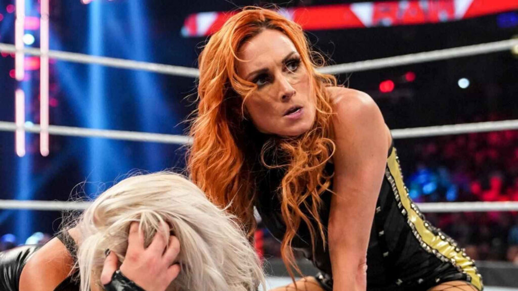 Becky Lynch WWE Superstar fiercely dominating the wrestling ring with intense action pose Wallpaper