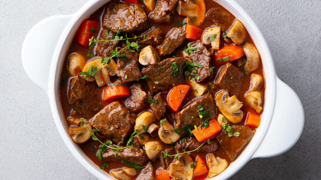 Beef Bourguignon Wallpaper: Savory Stew with Tender Beef & Herbs