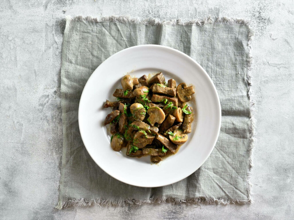 Beef Stroganoff Wallpaper: Classic Dish on Rustic Background