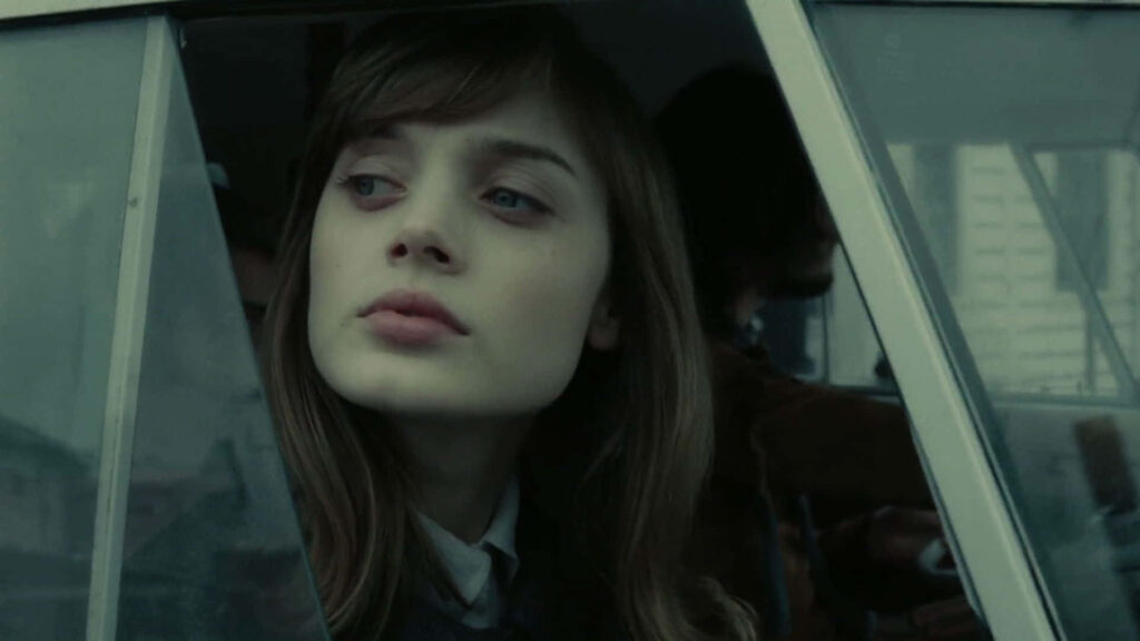 Bella Heathcote thoughtful gaze by window soft light reflective mood wallpaper background