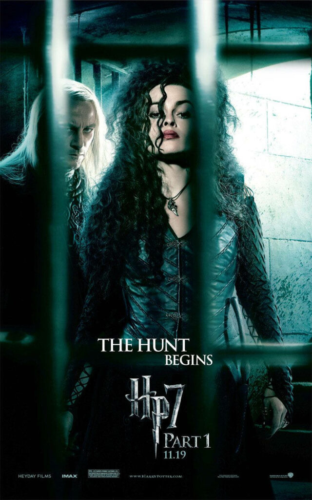 Bellatrix Lestrange behind prison bars with fierce look dark stone walls dim lighting wallpaper