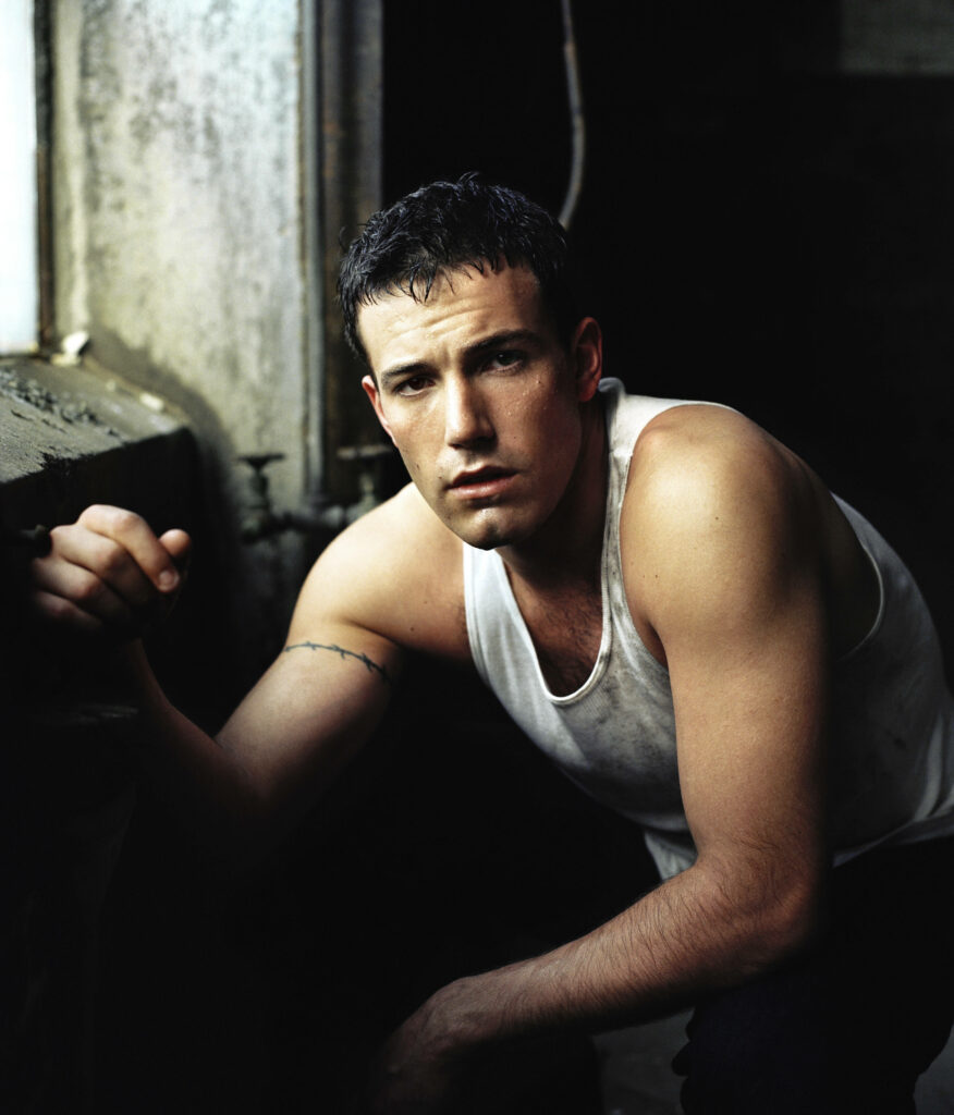 Ben Affleck Captivating Wallpaper: Intense Rugged Charisma Background