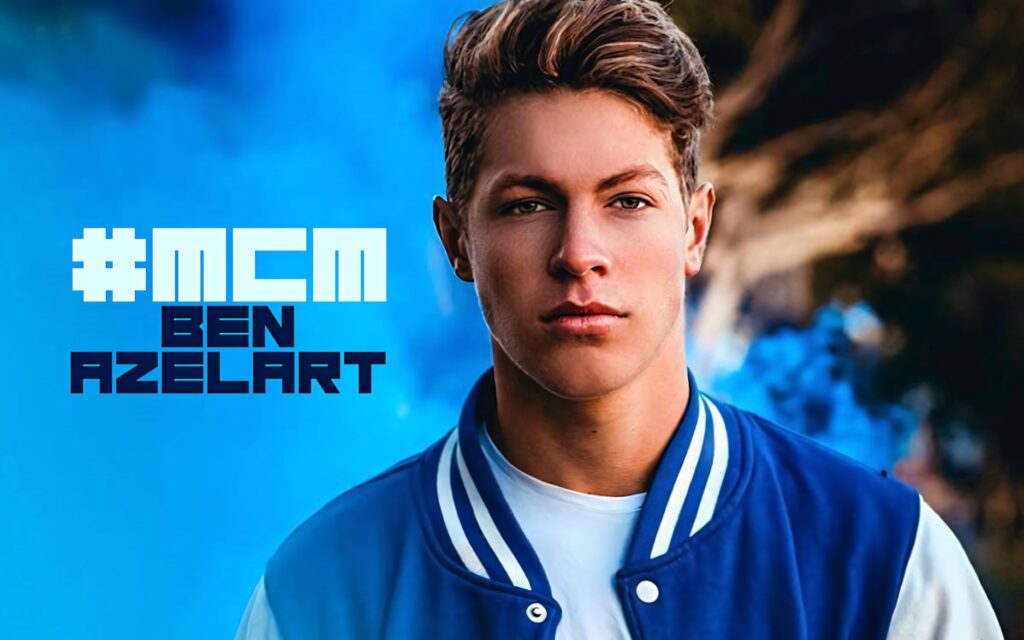 Ben Azelart in blue white varsity jacket with bold MCM text on blue smoke wallpaper background