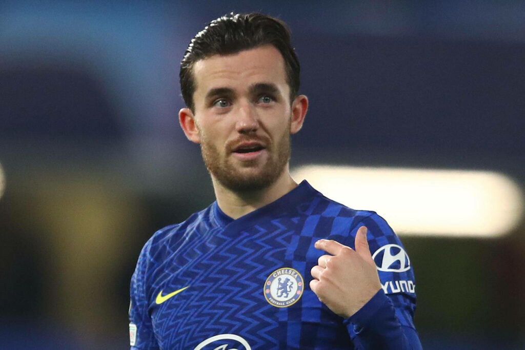 Ben Chilwell Chelsea FC player in blue kit directing play during intense football match action Wallpaper