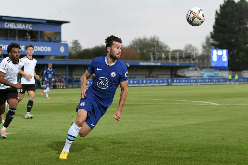 Ben Chilwell sprinting after soccer ball Chelsea FC match action wallpaper background