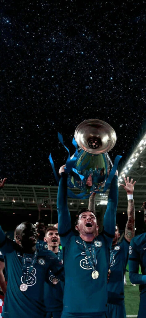 Ben Chilwell celebrates with Chelsea teammates lifting trophy under starry night sky wallpaper
