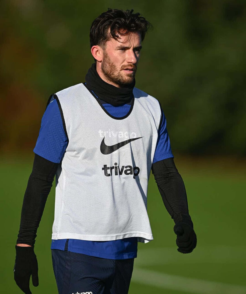 Ben Chilwell walking on football field training session focused in sports kit wallpaper background