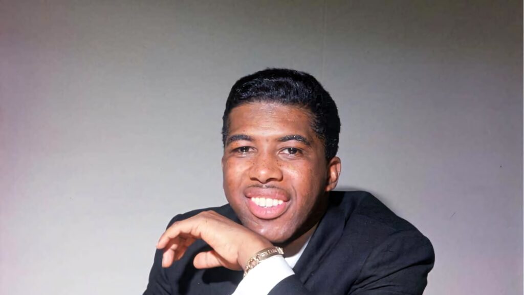 Ben E King classic portrait wallpaper featuring soulful smile timeless style iconic background