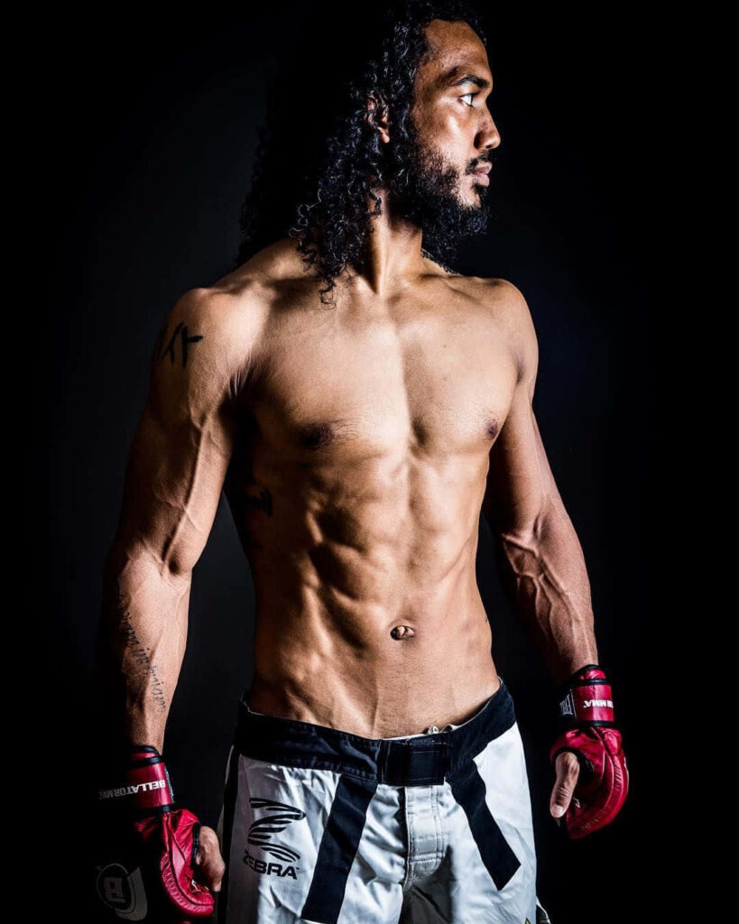 Shirtless American MMA star Ben Henderson showcasing powerful physique and intense focus Wallpaper