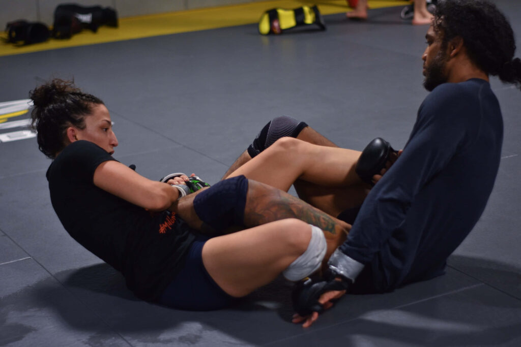 Ben Henderson and Maria Magana intense MMA grappling training session dynamic wallpaper background
