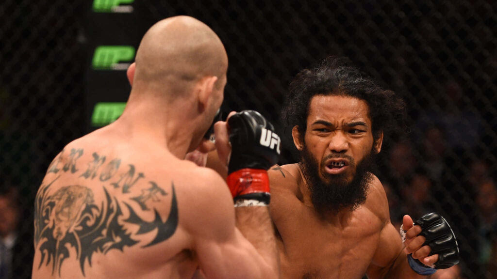 Ben Henderson and Brandon Thatch UFC fight intense action showing determination in the octagon wallpaper