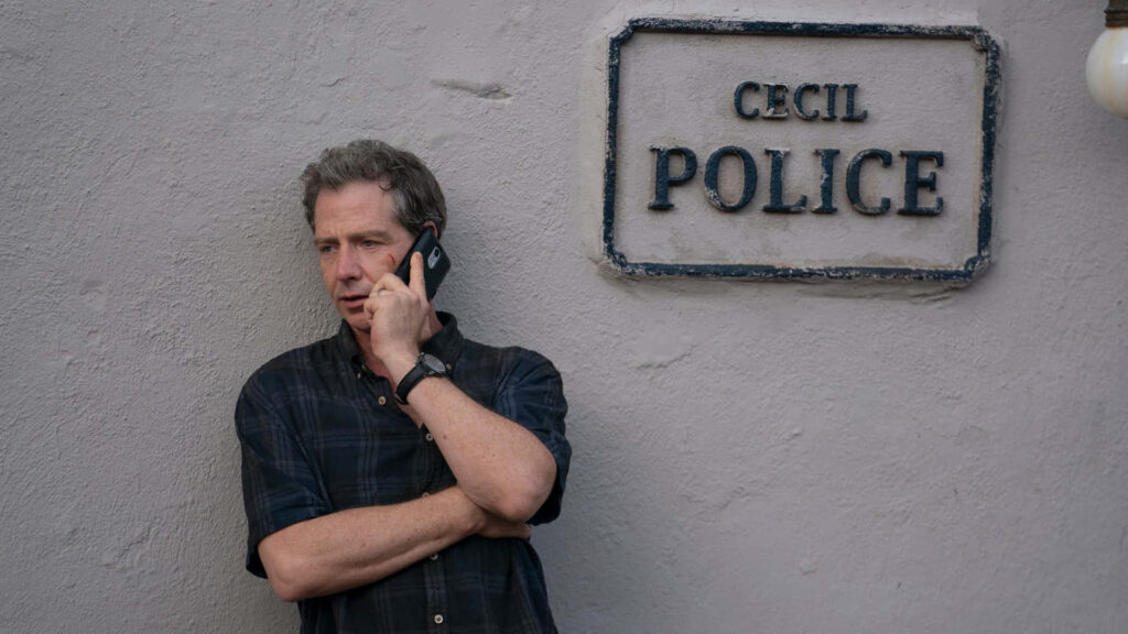 Ben Mendelsohn on phone outside Cecil Police building creating tense dramatic atmosphere wallpaper