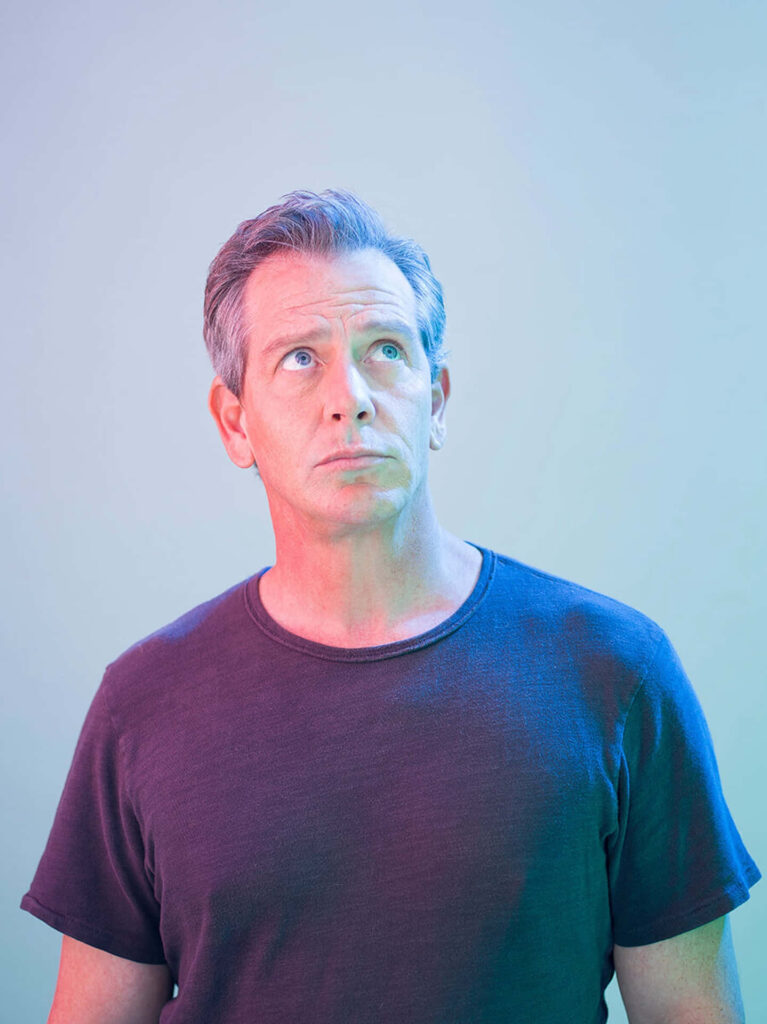 Ben Mendelsohn thoughtful portrait with colorful artistic lighting wallpaper background
