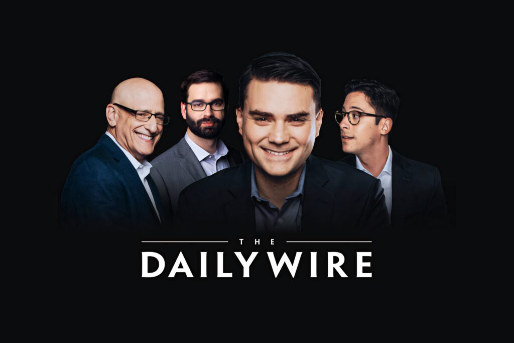 Ben Shapiro with The Daily Wire team on dark background featuring Daily Wire show logo wallpaper