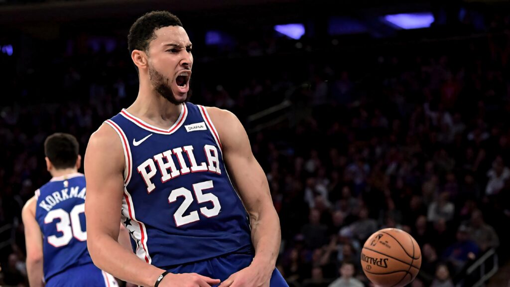 Ben Simmons shouting passionately in Philadelphia 76ers jersey during intense basketball game Wallpaper