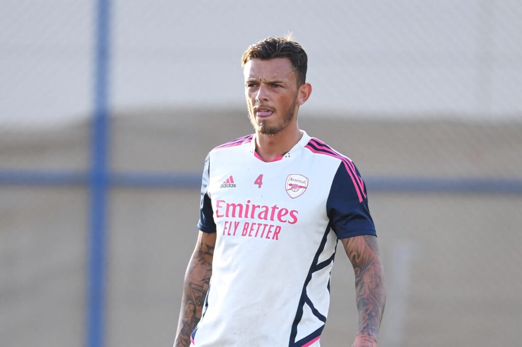 Ben White in Arsenal training kit showing focused expression with tongue out during practice session Wallpaper