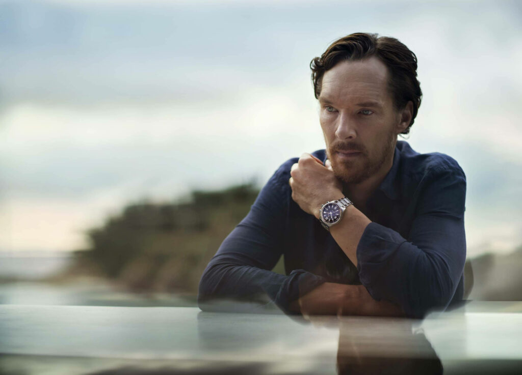 Benedict Cumberbatch with beard sitting outdoors thoughtful calm natural blurred background wallpaper