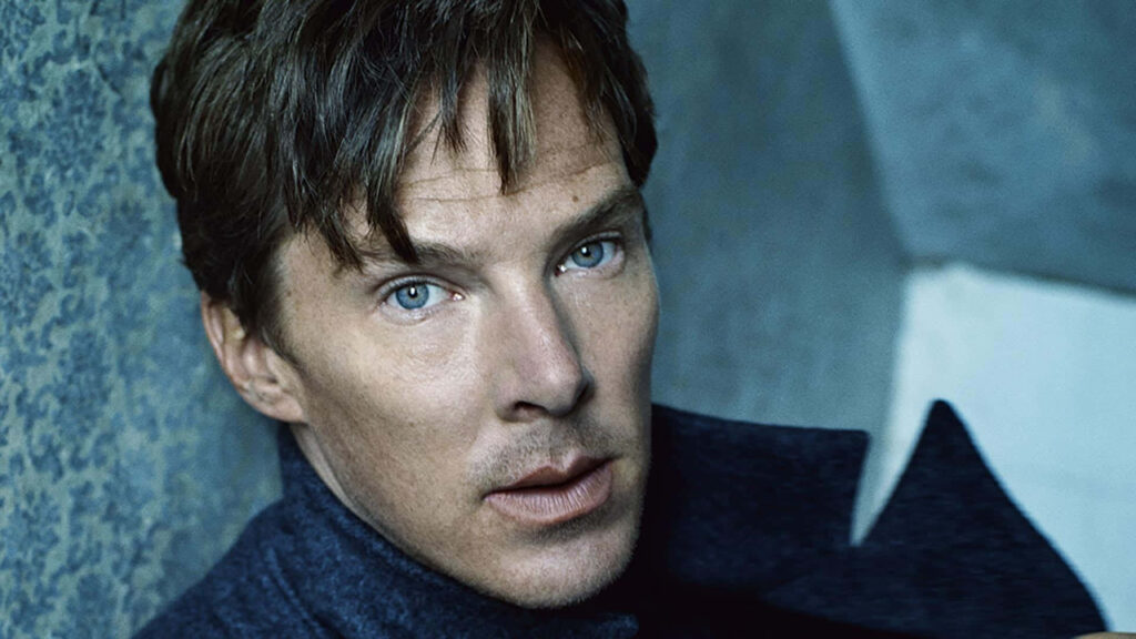 Close-up portrait of Benedict Cumberbatch with intense blue eyes contemplative expression wallpaper