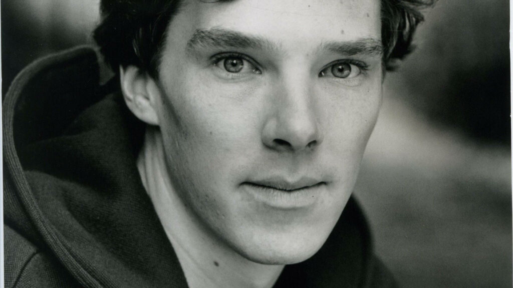 Grayscale close-up portrait of Benedict Cumberbatch showing expressive eyes and facial features Wallpaper