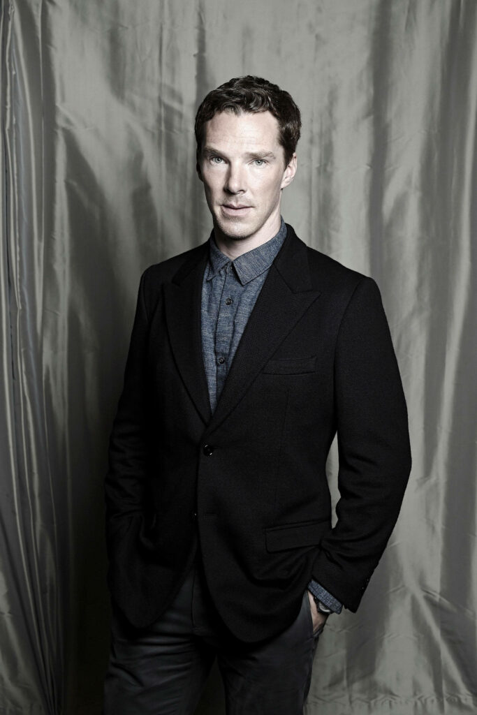 Benedict Cumberbatch grayscale portrait in dark suit with textured background wallpaper background
