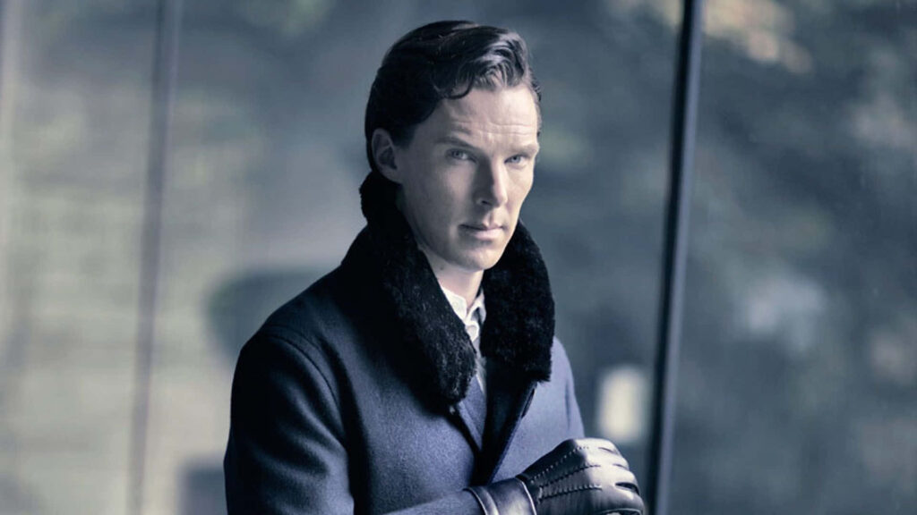 Benedict Cumberbatch in dark coat and gloves with blurred glass background wallpaper
