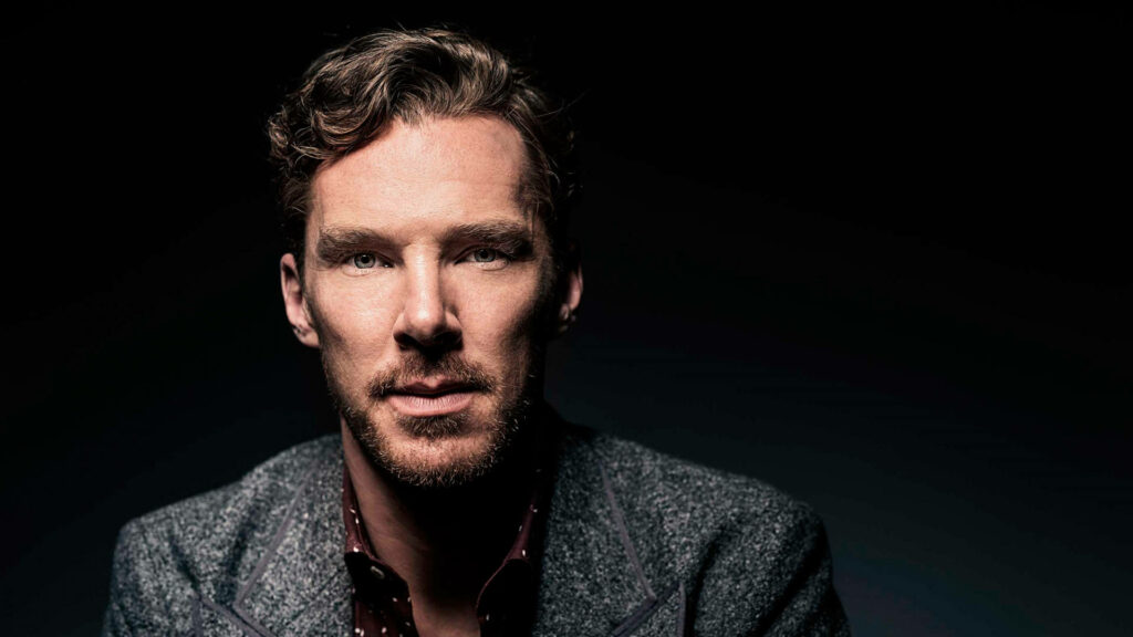 Benedict Cumberbatch in stylish gray jacket dramatic dark background magazine shoot wallpaper