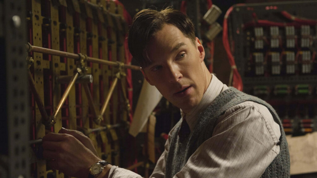 Benedict Cumberbatch as Alan Turing working on codebreaking machine in The Imitation Game Wallpaper