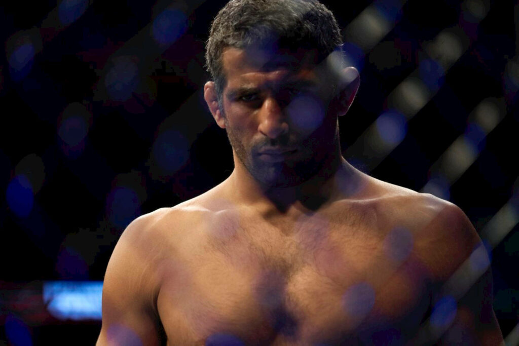Beneil Dariush focused and determined in the ring ready for intense MMA fight wallpaper background
